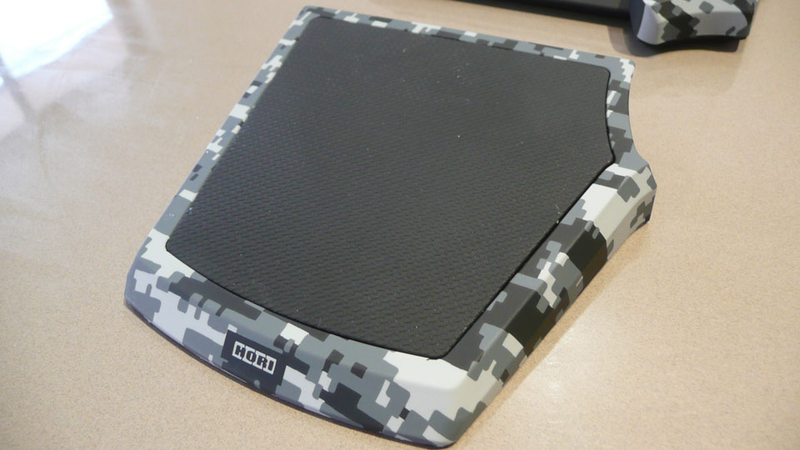Illustration for article titled Hori's TAC3 Brings a Mouse and (Tiny) Keyboard to the PS3